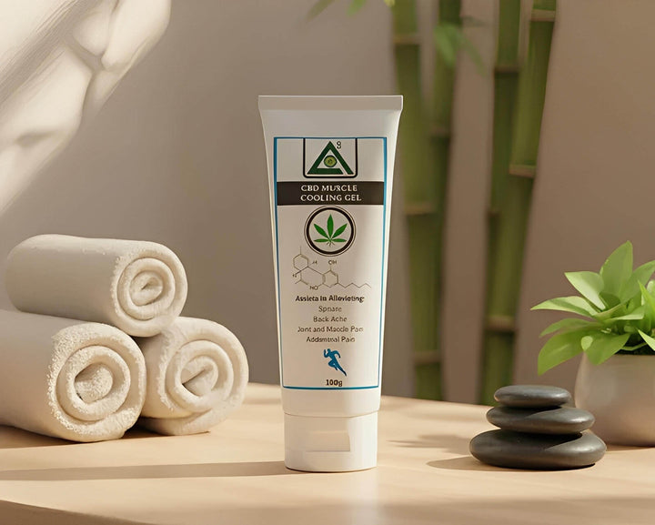 CBD muscle cooling gel tube on spa table with towels, stones, bamboo, Cape Town South Africa