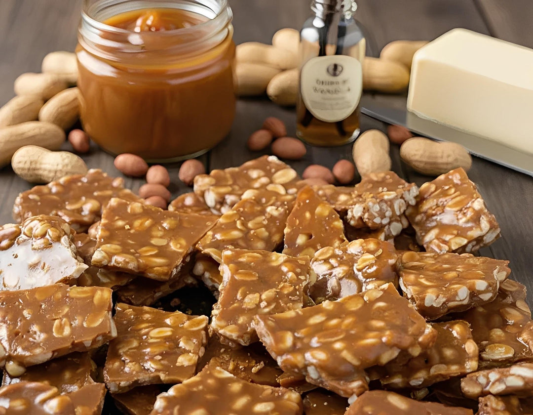 Cannabis peanut brittle pieces on wooden table with caramel, peanuts, vanilla, butter