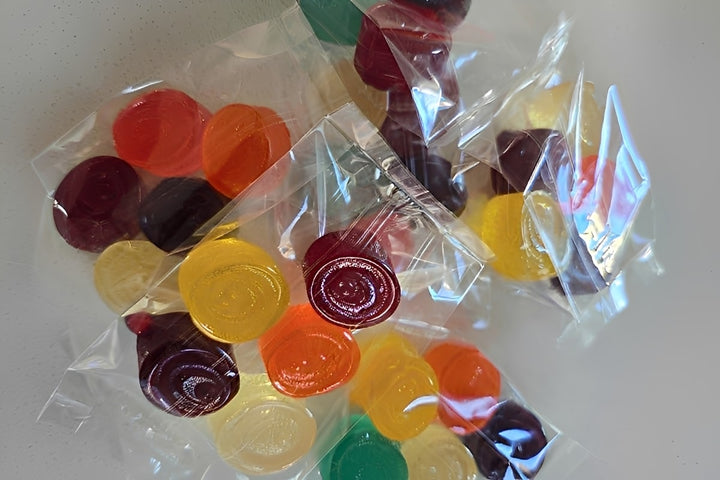 Colorful full-spectrum cannabis jelly beans packaged in clear bags for a flavorful edible experience