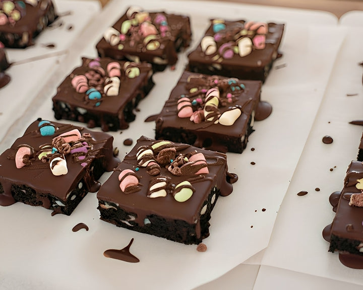 Chocolate cannabis brownies topped with colorful candy pieces for a rich and flavorful edible treat